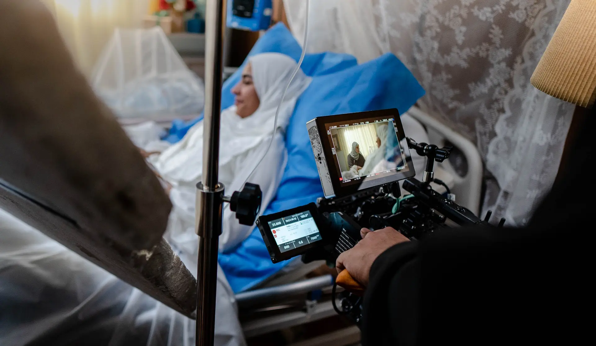 Creative team collaborating on set during a professional shoot