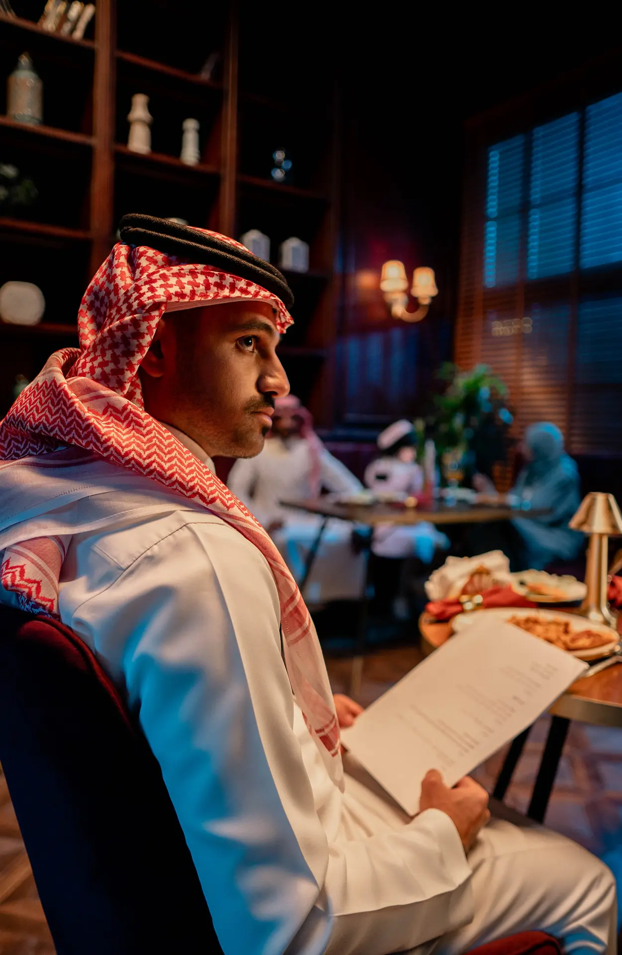 Behind the scenes view of cinematic equipment and crew at work